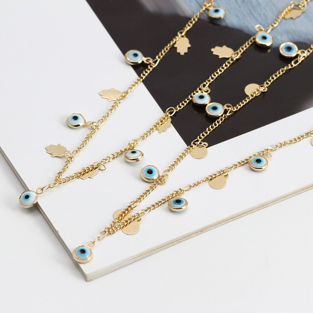 Ketting met Grieks oog en hamsa, goudkleurig staal 2 Ketting met Grieks oog en hamsa, goudkleurig staal - Afbeelding 2